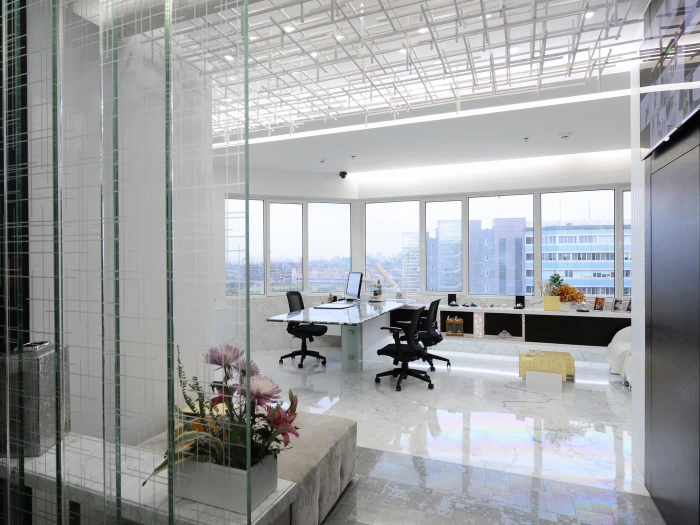 The Mumbai office seen through its etched glass partition